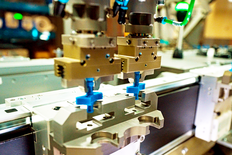Symphoni assembly machine with golden parts
